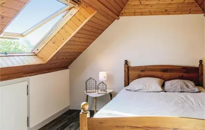 Un ou plusieurs lits dans un hébergement de l'établissement Awesome Home In Hauteville-Sur-Mer