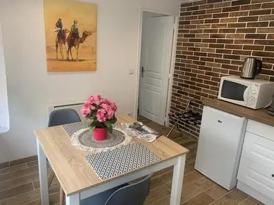 Cuisine ou kitchenette dans l'établissement Gîte centre ville avec cour