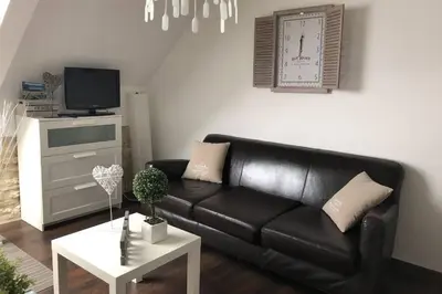 Télévision ou salle de divertissement dans l'établissement Appartement front mer proche omaha & utah beach - 3