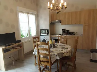 Cuisine ou kitchenette dans l'établissement petite maison de vacance 2 chambres