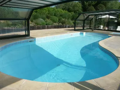 Piscine de l'établissement Hotel Nuit Et Jour - La Maison de Lucile ou située à proximité