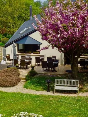 Jardin de l'établissement Hotel Nuit Et Jour - La Maison de Lucile