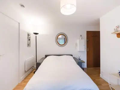 Un ou plusieurs lits dans un hébergement de l'établissement Appartement à Port-en-Bessin proche mer