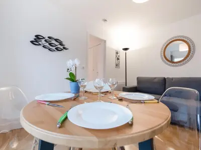 Coin salon dans l'établissement Appartement à Port-en-Bessin proche mer