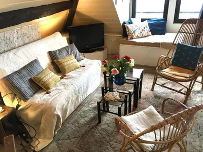 Coin salon dans l'établissement Appartement vue mer Granville
