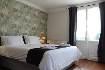 Un ou plusieurs lits dans un hébergement de l'établissement Le Clos Castel