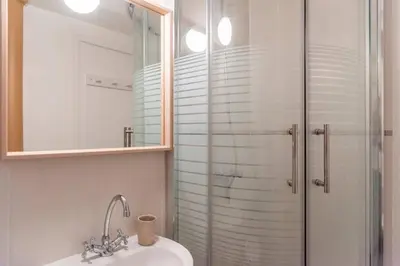 Salle de bains dans l'établissement Appartement au calme + parking
