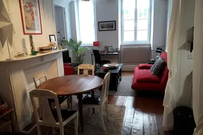 Coin salon dans l'établissement Appartement la haute ville Granville
