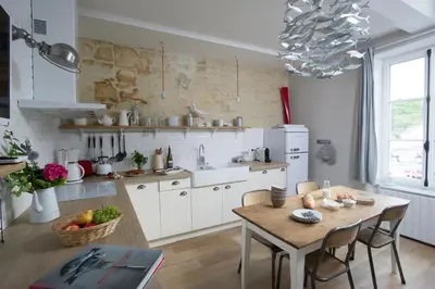 Cuisine ou kitchenette dans l'établissement Appartement vue port