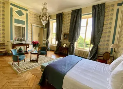 Un ou plusieurs lits dans un hébergement de l'établissement Château de La Ferrière