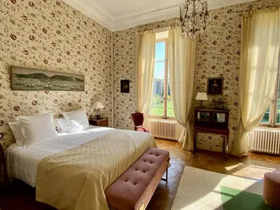 Un ou plusieurs lits dans un hébergement de l'établissement Château de La Ferrière