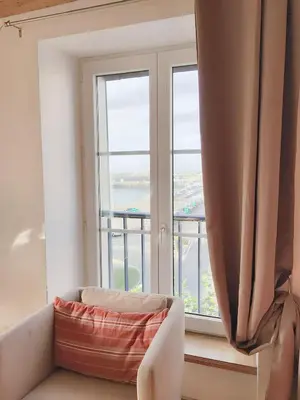 Un ou plusieurs lits dans un hébergement de l'établissement Appartement charmant avec vue sur la mer à Granville - 55 m²