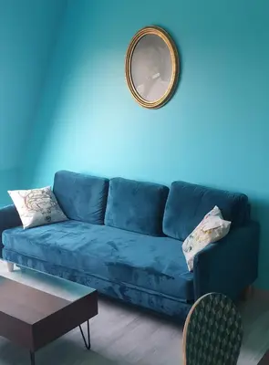 Coin salon dans l'établissement Home sweet home Cabourg plage