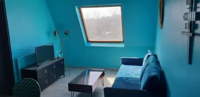 Coin salon dans l'établissement Home sweet home Cabourg plage