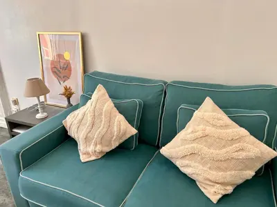 Coin salon dans l'établissement 17 Rue du Puits de la Place