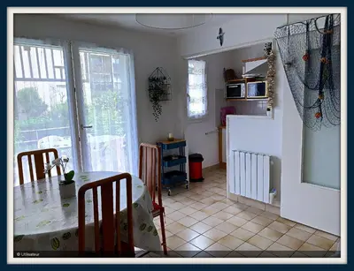 Cuisine ou kitchenette dans l'établissement Cabourg, Appartement plain pied avec terrasse accès direct à la plage