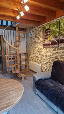Coin salon dans l'établissement gites 2 beauvoir