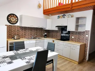 Cuisine ou kitchenette dans l'établissement L'Ancre Marine