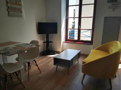 Télévision ou salle de divertissement dans l'établissement Studio Cosy Breizh