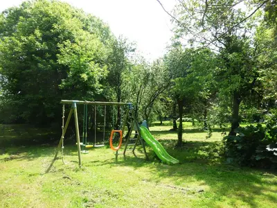 Aire de jeux pour enfants de l'établissement Holiday Home La Gicquelière by Interhome
