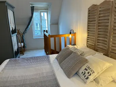 Un ou plusieurs lits dans un hébergement de l'établissement Charmante maison de pêcheur 50 m de la plage et du Port
