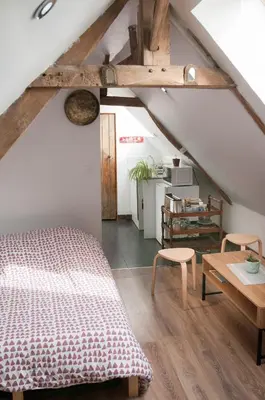 Un ou plusieurs lits dans un hébergement de l'établissement Logement cosy à proximité de Bayeux