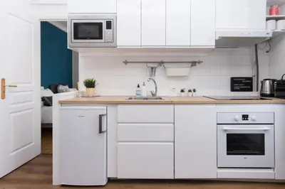 Cuisine ou kitchenette dans l'établissement Cabourg Cosy chic Cabourg hyper-centre 4 pers, 2 bedrooms , 2 sdb, terrasse, wifi