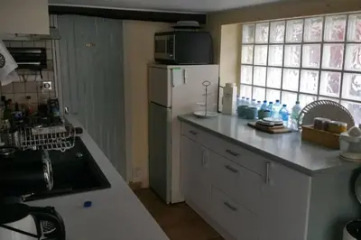 Cuisine ou kitchenette dans l'établissement Maison de pêcheur