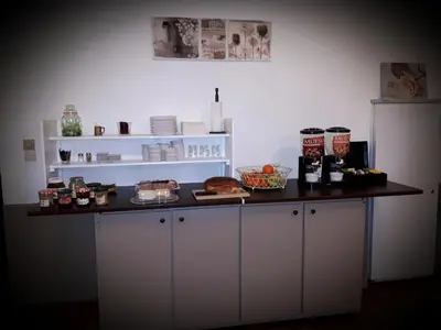 Cuisine ou kitchenette dans l'établissement Aux Chambres du Mont