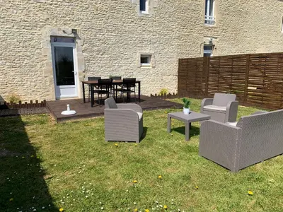 Coin salon dans l'établissement Gîte avec jardin à 1,5 km des plages du débarquement