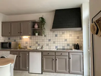 Cuisine ou kitchenette dans l'établissement Le Grand Appart' proche commerces