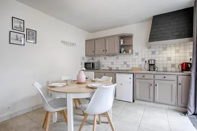 Cuisine ou kitchenette dans l'établissement Le Grand Appart' proche commerces