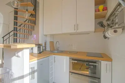 Cuisine ou kitchenette dans l'établissement Duplex Margareth Welkeys