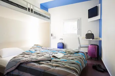 Un ou plusieurs lits dans un hébergement de l'établissement FYL GOOD ex hotelF1 Cherbourg