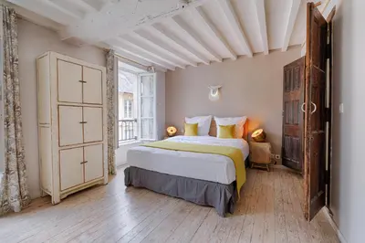 Un ou plusieurs lits dans un hébergement de l'établissement Maison de ville Bayeux