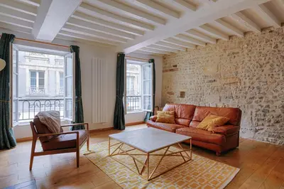 Coin salon dans l'établissement Maison de ville Bayeux
