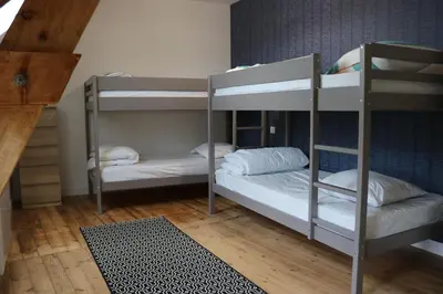 Un ou plusieurs lits dans un hébergement de l'établissement LE MASCARET 47 b Gîte touristique 3 étoiles