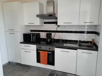 Cuisine ou kitchenette dans l'établissement LE MASCARET 47 b Gîte touristique 3 étoiles