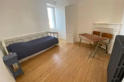 Un ou plusieurs lits dans un hébergement de l'établissement Appartement lumineux Cancale, 80m2, 3 chambres.