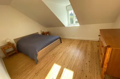Un ou plusieurs lits dans un hébergement de l'établissement Appartement lumineux Cancale, 80m2, 3 chambres.