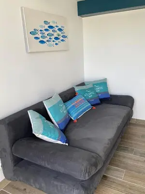 Coin salon dans l'établissement Maisonnette de la mer