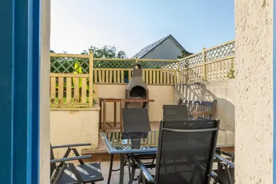 Balcon ou terrasse dans l'établissement Marine - Maison et jardin - Grande Plage à 150 m