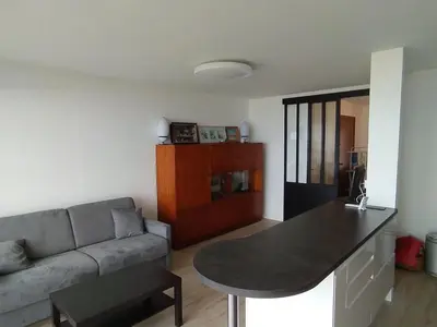 Coin salon dans l'établissement 57 M2 LES PIEDS DANS l EAU Cabourg