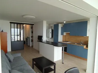 Cuisine ou kitchenette dans l'établissement 57 M2 LES PIEDS DANS l EAU Cabourg