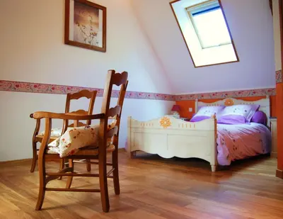 Un ou plusieurs lits dans un hébergement de l'établissement Le Clos des Tilleuls - D Day Home