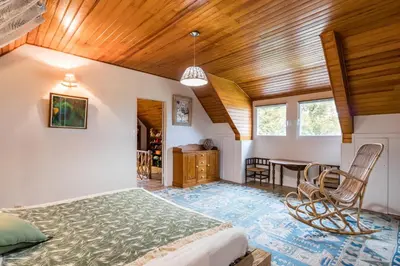 Un ou plusieurs lits dans un hébergement de l'établissement La Maison Bleue au coeur des Plages du Débarquement