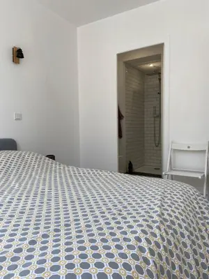 Un ou plusieurs lits dans un hébergement de l'établissement Cosy Flat Carteret - Appartement centre bourg - 4 personnes