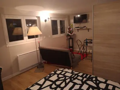 Un ou plusieurs lits dans un hébergement de l'établissement Charmante Maison studio proche mer et commerces