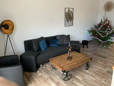 Coin salon dans l'établissement Belle Villa 6 pers 2h espace bien-être privatisé inclus 80 m2 de détente garantie