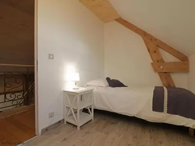 Un ou plusieurs lits dans un hébergement de l'établissement Maison authentique près d'un étang avec animaux acceptés, linge et ménage inclus - FR-1-497-142